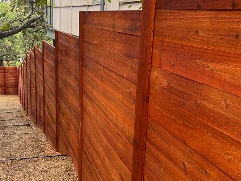 Custom cedar horizontal fence built in Austin by Daniel Jimenez Landscape and Fencing